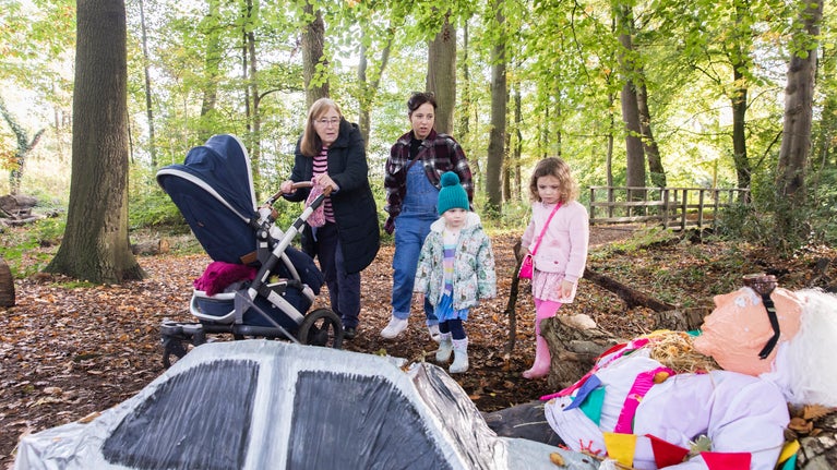Families exploring the scarecrow trail, Rufford Old Hall
